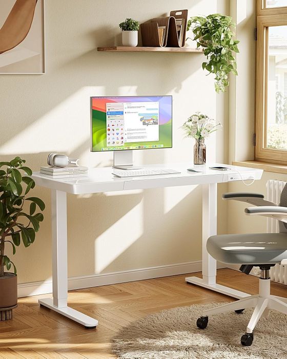 a white glass standing desk
