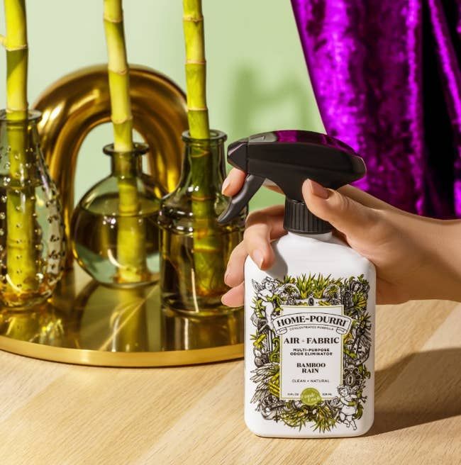A bottle of Poo-Pourri spray in Bamboo Rain scent.