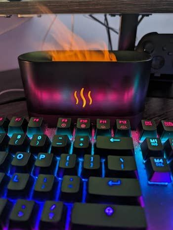 A still shot of the humidifier sitting on a desk.