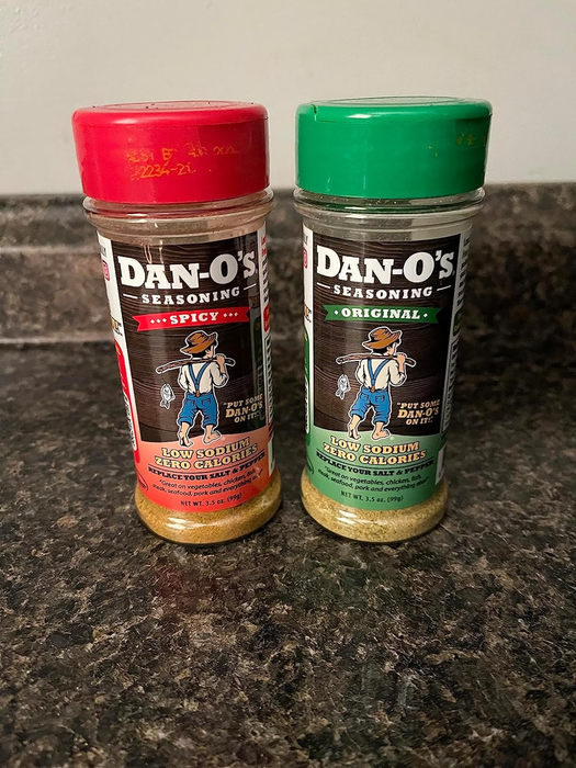 Two jars of Dan-O's seasoning, ready to elevate your dishes.