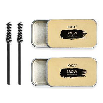 The two sets of eyebrow soap and spoolie brushes included in the package.
