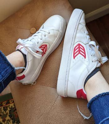 Mytour editor rocking the same sneakers with the red logo on the side and heel tab