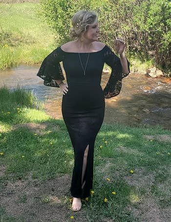 A reviewer in the black dress outdoors