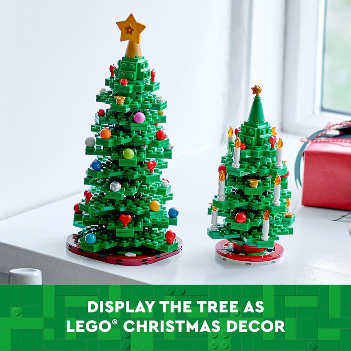 Two LEGO Christmas trees on a table