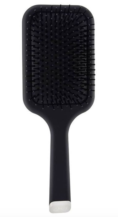 A sleek black paddle hairbrush