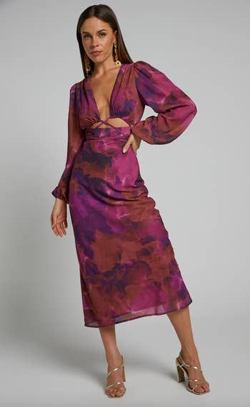 front view of a model wearing the cut-out dress