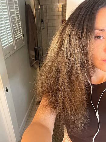 A reviewer’s hair before applying the oil