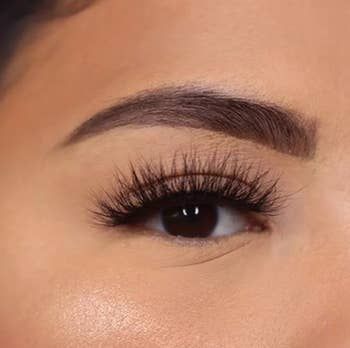 a model sporting the natural-looking false lashes