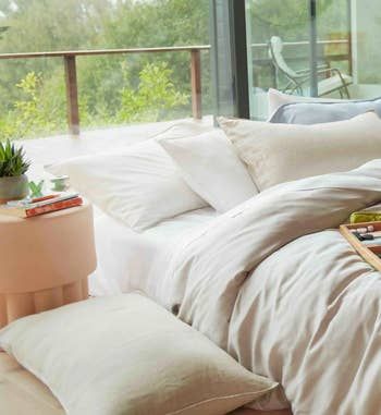 three pillows neatly arranged on a bed