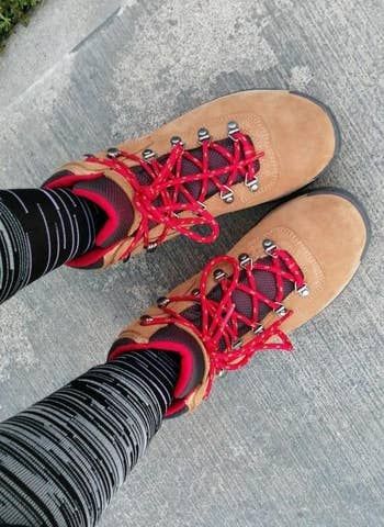 top-down view of the brown and red boots