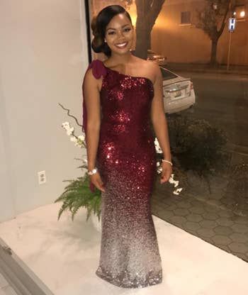 reviewer wearing a dress at a formal event