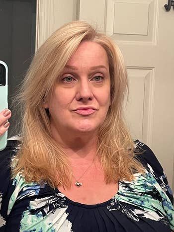 A reviewer’s hair after using the spray, looking visibly fuller and more voluminous