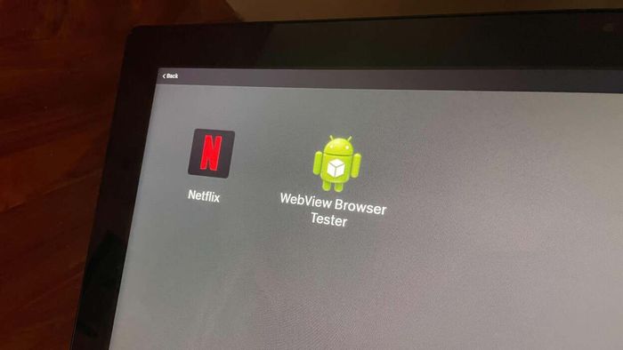 Image of a Peloton display featuring the Netflix app alongside a system browser