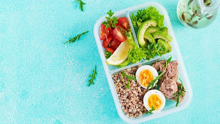 lunchbox containing eggs and vegetables