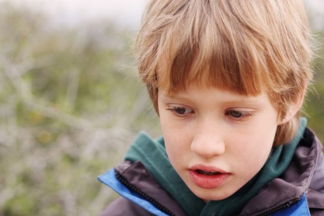 Outdoor portrait of a 6-year-old boy