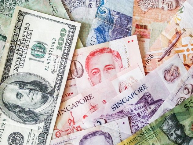 A diverse assortment of currencies from nations across the world