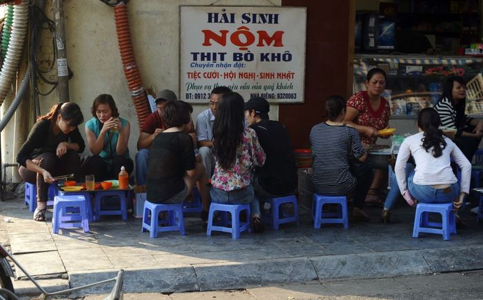 Enjoy a papaya salad with beef in Hanoi’s Old Quarter.