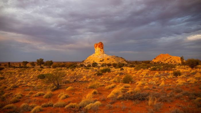 The Chambers Pillar, a striking sandstone formation located 100 miles south of Alice Springs, is just one of the many wilderness gems in the Northern Territory.