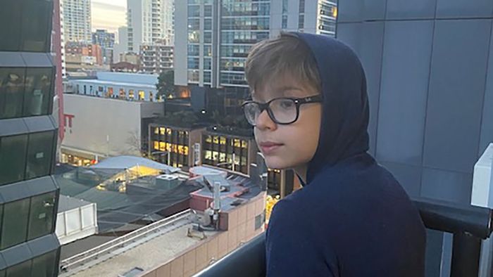 Jack Levine looks out from the window of the Meriton Suites Hotel in Sydney.