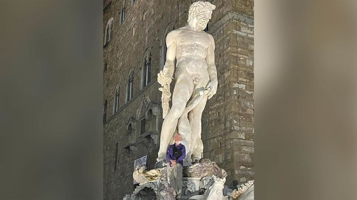 The mayor of Florence shared a photo on Twitter showing the 22-year-old German tourist, whose face was obscured, perched on the 16th-century Fountain of Neptune in Piazza della Signoria.