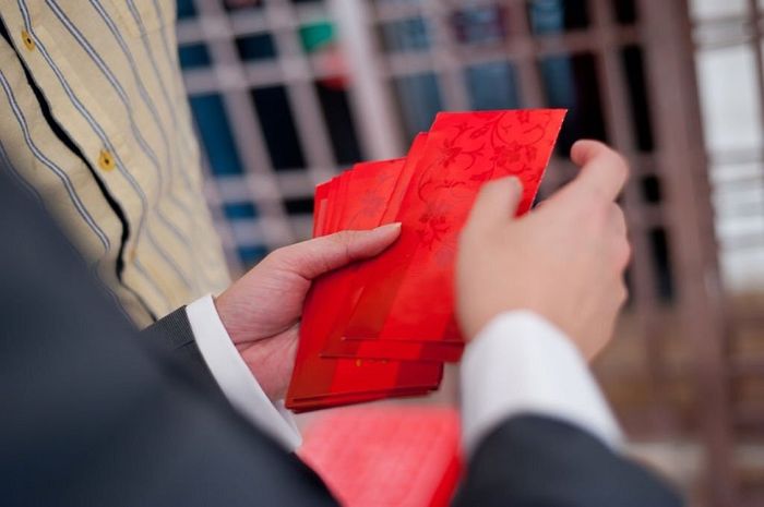 Nguồn gốc của tục lì xì vào dịp Tết đầu năm