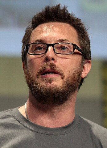 https://upload.wikimedia.org/wikipedia/commons/thumb/2/22/Duncan_Jones_by_Gage_Skidmore_2.jpg/347px-Duncan_Jones_by_Gage_Skidmore_2.jpg