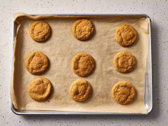 Golden-brown pumpkin cheesecake cookies, perfectly baked to perfection.