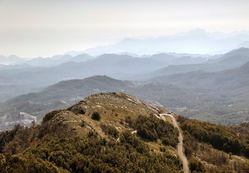 a sweeping panoramic view of the Lovćen Mountains