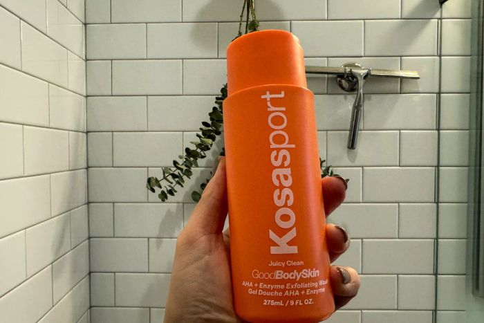 A person holding the KOSAS Good Body Skin Body Wash