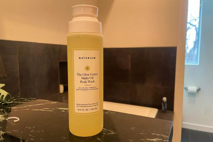 Naturium The Glow Getter bottle on a bathroom counter