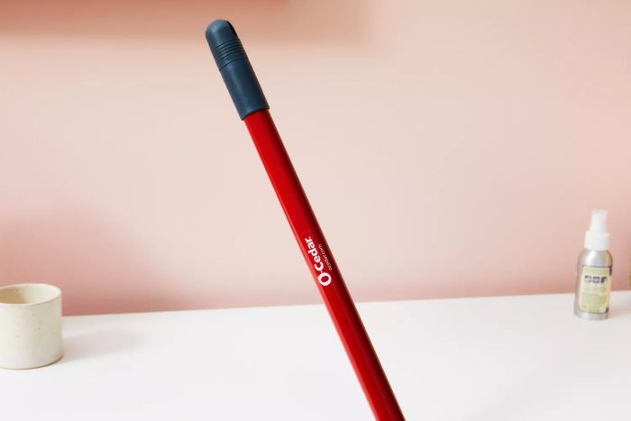 A close-up view of the O-Cedar Dual-Action Microfiber Sweeper Dust Mop.