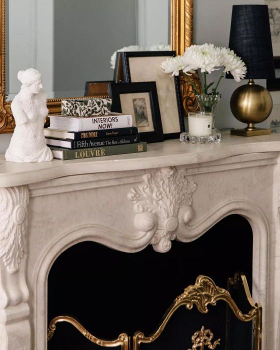 A Greek bust placed on a mantel