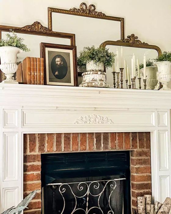 Layering mirrors across the fireplace mantel.