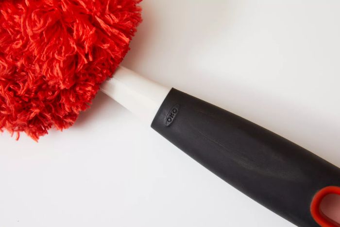 The handle of the OXO Good Grips Microfiber Hand Duster.