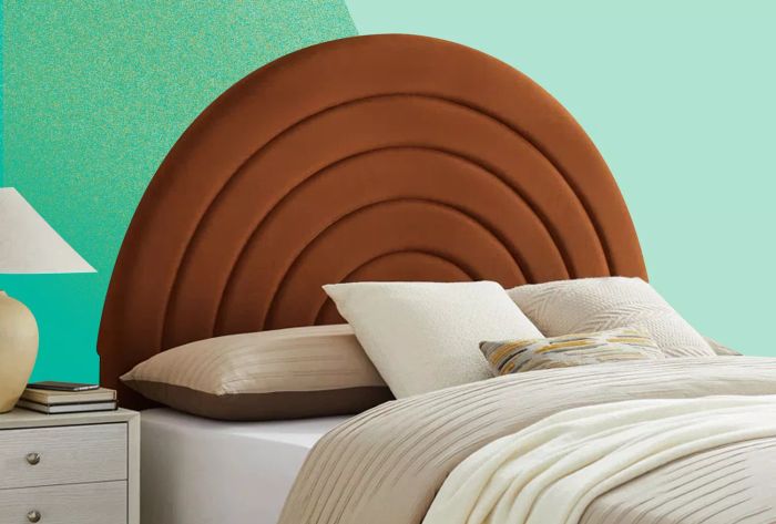 The Modway Solana Arched Performance Velvet Headboard displayed against a dual-tone green wall