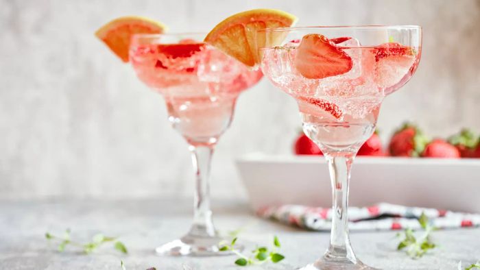 wine spritzers with fruit garnish
