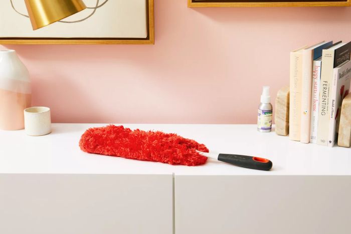 OXO Good Grips Microfiber Hand Duster placed on a white countertop.