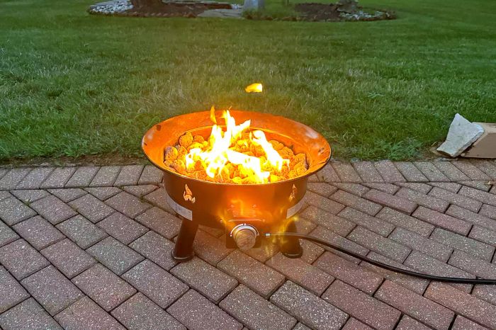 The Outland Living Mega Fire Pit being used in an outdoor setting