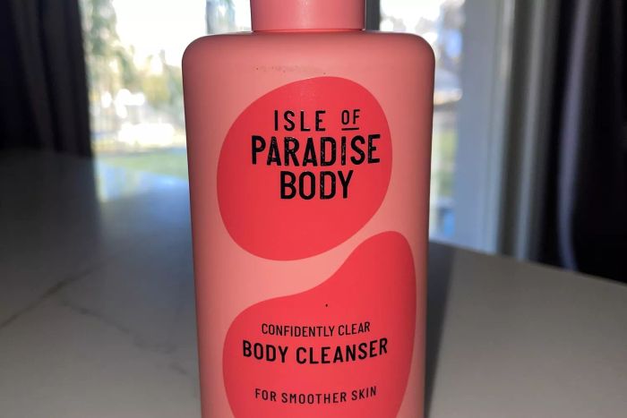 Isle of Paradise Confidently Clear Body Cleanser on a counter