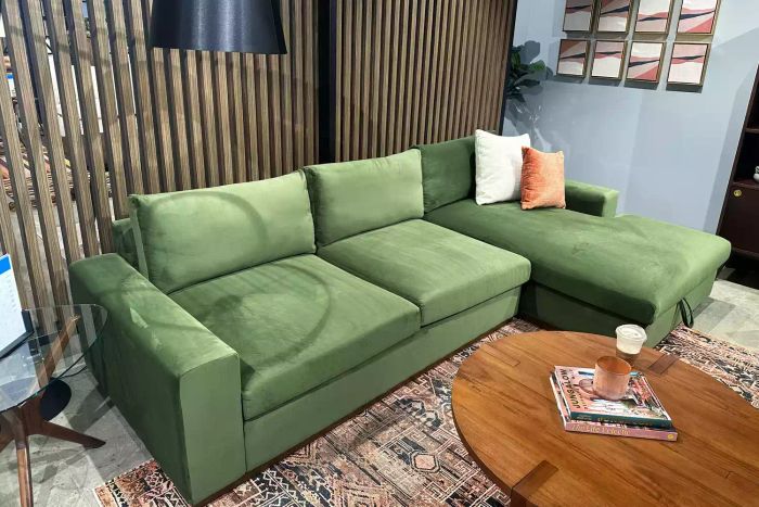 The Joybird Holt Sectional with Storage displayed in a showroom