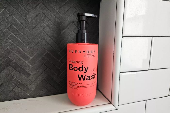 frank body Everyday Clearing Body Wash in a shower nook