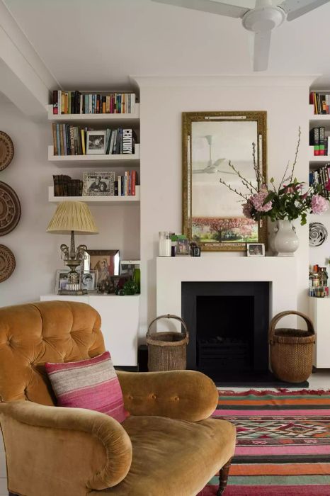 Living Room Featuring a Mirror Above the Mantel