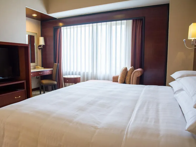 Ảnh Happy Holiday Hotel (Zhongshan Shiyan Daxin Xinduhui Branch)