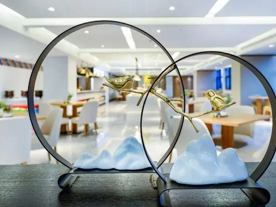 Ảnh New Century Manju Hotel (Hangzhou Xindeng Fuchungang)